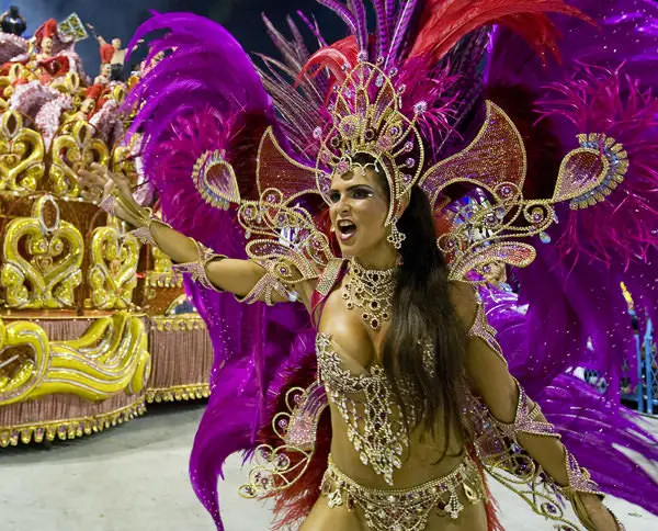 An Academicos do Grande Rio samba school dancer performs down the Sambodrome on the first night of the Carnival samba school parade in Rio de Janeiro.
